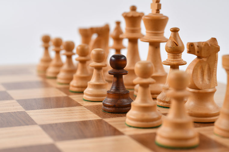 Chess board with pieces lined up.